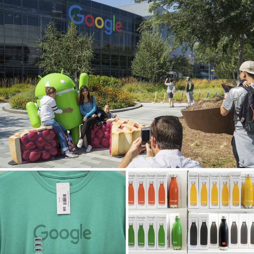 Tourists shop and snap photographs at the Googleplex in Mountain View, Calif.