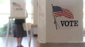 Voting booths stand ready for use in a U.S. election.