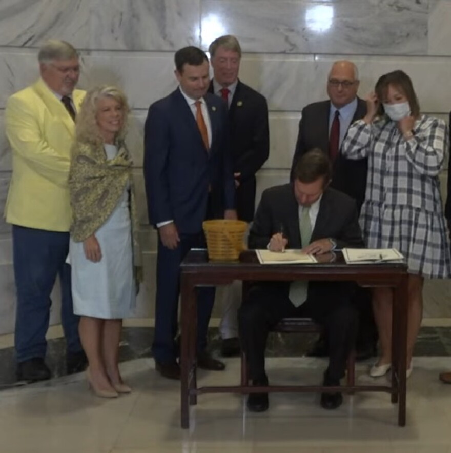 Gov. Beshear signs Senate Bill 9 into law, he is joined by the Lt. Governor, sponsors and literacy advocates