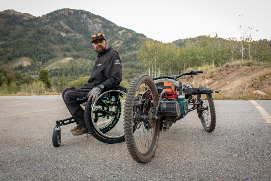 Marshall Evans next to his adaptive bike after riding Canyon Rim Trail at Snowbasin Resort, Sept. 10, 2026.