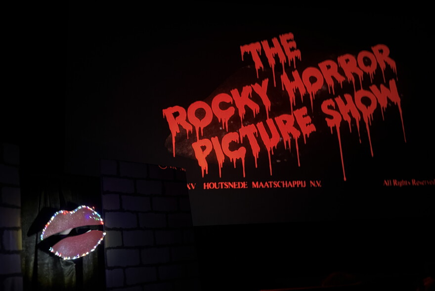 Prop lips sing along to the opening track from "The Rocky Horror Picture Show" during a shadow cast performance on Thursday, Oct. 29, 2026 near Soldotna, Alaska.