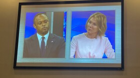 A screen in a KET viewing room shows Republican governor candidates Daniel Cameron, left, and Kelly Craft during a recent debate.