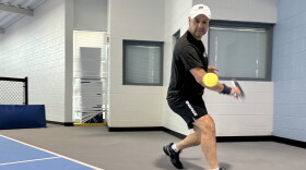 Top-ranked over 50 pickleball player Youssef Bouzidi lines up a backhand at Carilion Wellness.