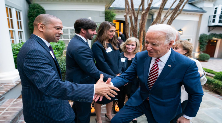 Sen. Kimpson pictured in Feb. 2020 shaking hands with Joe Biden