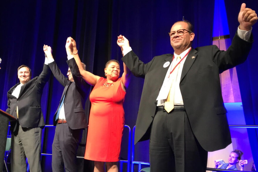 A state party convention staple that will be missing this year: in 2018, Indiana Democrats' statewide candidates joined hands on stage as the convention wrapped up.