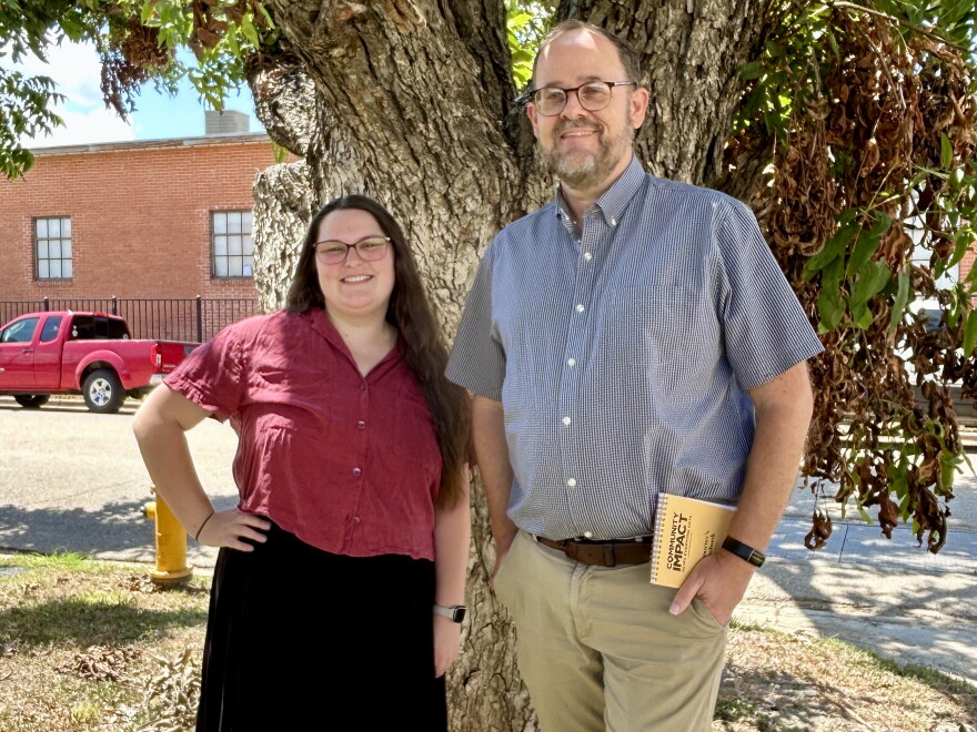 KWBU's Molly-Jo Tilton, left, and The Waco Bridge's J.B. Smith pose for a photo outside the KWBU studios.