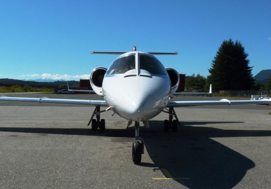 An Airlift Northwest Lear Jet waits for a medevac call at Juneau’s airport. Airlift continues offering medevac insurance, but Apollo Medi Trans lost its state license to renew or issue policies in February. EdSchoenfeld/CoastAlaska photo.
