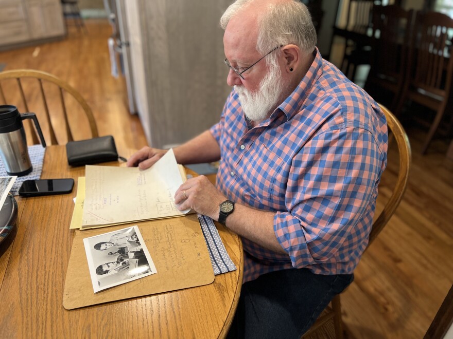 H. Michael Sanders sifts through a script of "The Storm" written by Rod Serling.
