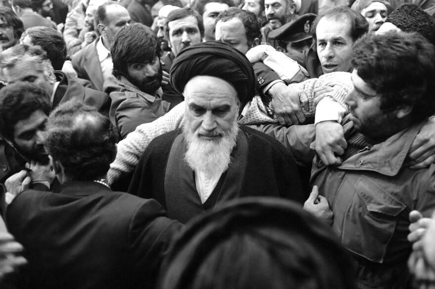 Ayatollah Khomeini was mobbed by supporters when he returned from exile in the 1979 revolution that overthrew the shah. Khomeini saw Iran's nuclear program as a symbol of Western influence and had no interest in pursuing it, at least initially.