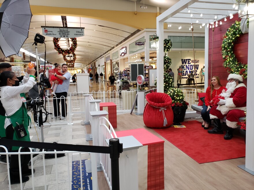 Children taking pictures with Santa Claus outside Macy's at North Star Mall on Wednesday.jpg