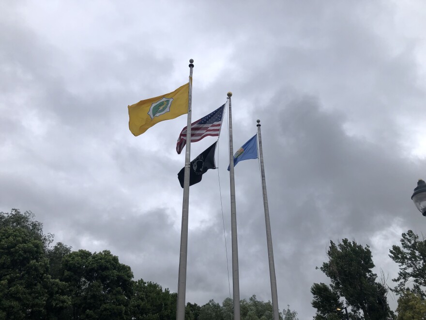 Flags outside Bozeman City Hall prior to vote on July 15, 2025