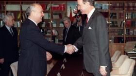Soviet leader Mikhail Gorbachev (L) and U.S. President George Bush (R) shake hands on Dec. 2, 1989 on board the soviet cruise "Maxim Gorki", shipdocked at Marsaxlokk harbour, before the start of their first summit meeting, just a few weeks after the fall of the Berlin Wall. This summit is viewed as the official end of the Cold War. (Jonathan Utz/AFP via Getty Images)