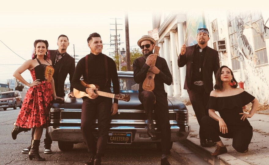 Promotional photo depicting band members and artivists of Las Cafeteras.