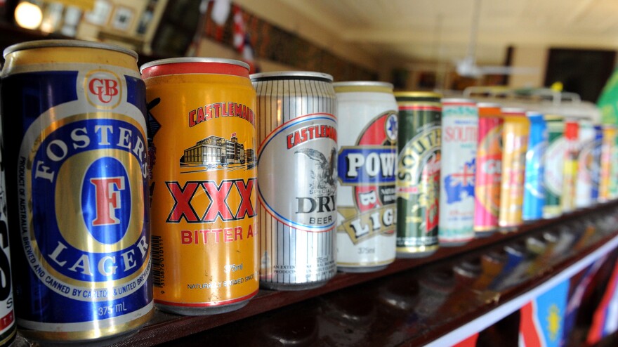 A row of beer cans in Australia, where a man's beer fridge has been blamed for playing havoc with the cellphone network in several neighborhoods.