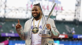 American League's Vladimir Guerrero Jr., of the Toronto Blue Jays, holds his trophy after winning the MLB All-Star baseball Home Run Derby in Seattle, Monday, July 10, 2023. (AP Photo/Lindsey Wasson)