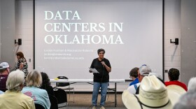 Honor the Earth Volunteer Coordinator Patricia Kaseca stands at the front of the room to introduce herself to her Muskogee neighbors. She helped organize Muskogee's first town hall to inform those in her town about the data centers in Oklahoma.