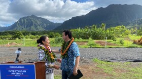 Sen. Brian Schatz introduces Interior Secretary Deb Haaland at the restored Heʻeia fishpond and farm.