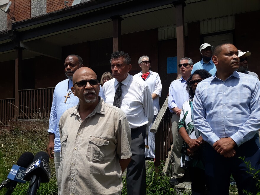 Rick Adams joins other Black activists at a Homewood event in urging City Council to delay a vote on plans to spend $335 million in federal COVID funds.