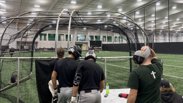 Eduardo May, center, at a practice in Hughes Field House on Jan. 15.