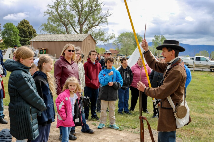 Camp Floyd State Park, volunteer reenactor with a rifle