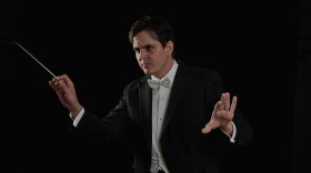 Carlos Izcaray, who was born in Venezuela, conducts the Alabama Symphony Orchestra during a performance. (Courtesy of the Alabama Symphony Orchestra)