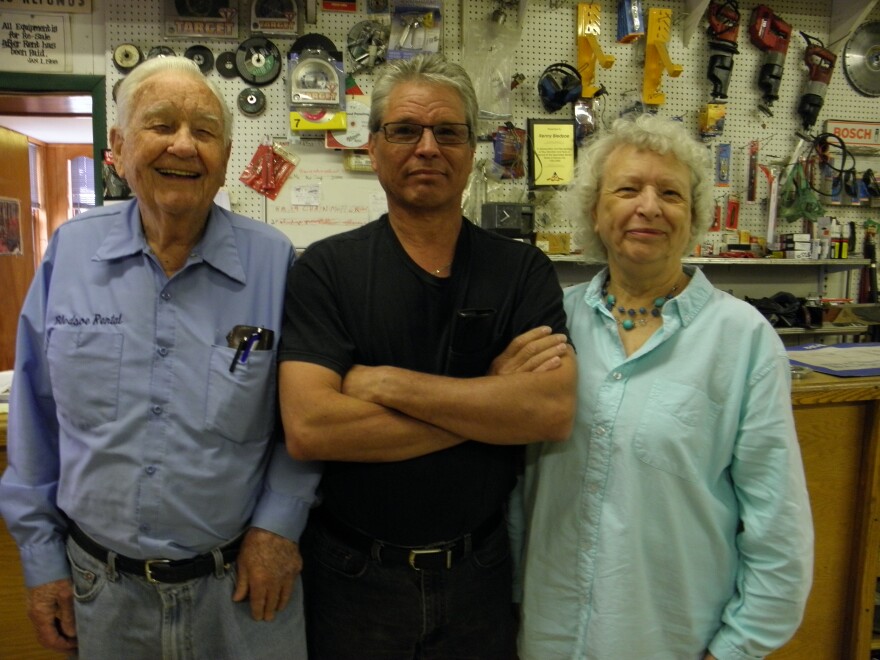 Veteran businessman Kenneth Bledsoe with his wife and son.