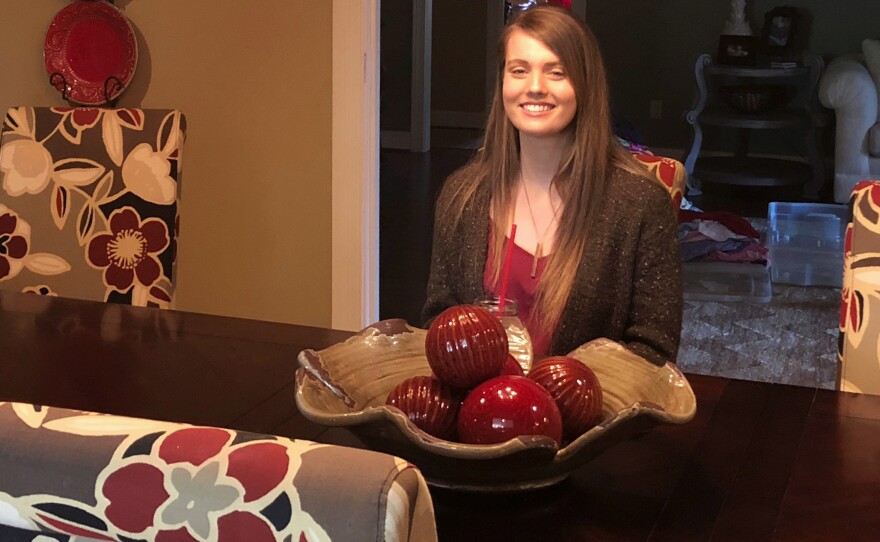Leighton Solomon, a junior at Marshall County High School, sits in her family's dining room. She was never political, she says — but she's started campaigning to promote school safety, after being inspired by the students at Stoneman Jackson.