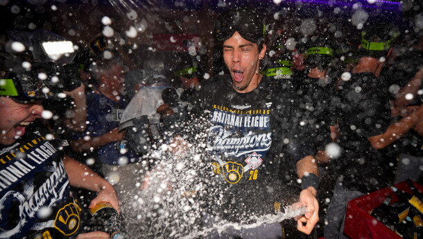 Milwaukee Brewers designated hitter Christian Yelich celebrates winning the NLCS Championship after Game 4 of baseball's National League Championship Series between the Milwaukee Brewers and the Los Angeles Dodgers, Thursday, Oct. 15, 2026, in Los Angeles. (AP Photo/Ashley Landis)