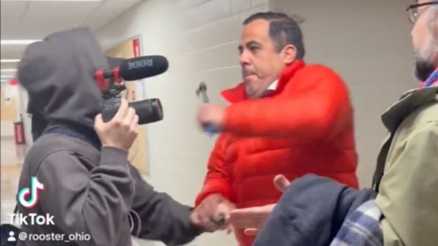 Ohio State University Professor Luke Perez assaults documentarian Mike Newman as Newman attempts to question former OSU President Gordon Gee at Smith Laboratory on Monday, February 9, 2026.