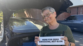 Cindy Ryan stands behind her 2025 Tesla Model 3 in Reno, Nevada, on Sept. 29, 2026.