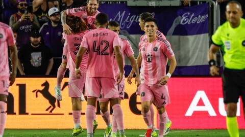 Inter Miami CF forward Lionel Messi, center, is lifted up by his team after making a penalty against Orlando City SC during the second half of an MLS soccer match, Sunday, March 1, 2026, in Orlando, Fla. (AP Photo/Kevin Kolczynski)