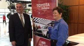 Indiana Gov. Eric Holcomb and TMMI President Millie Marshall were all smiles at Tuesday's announcement.