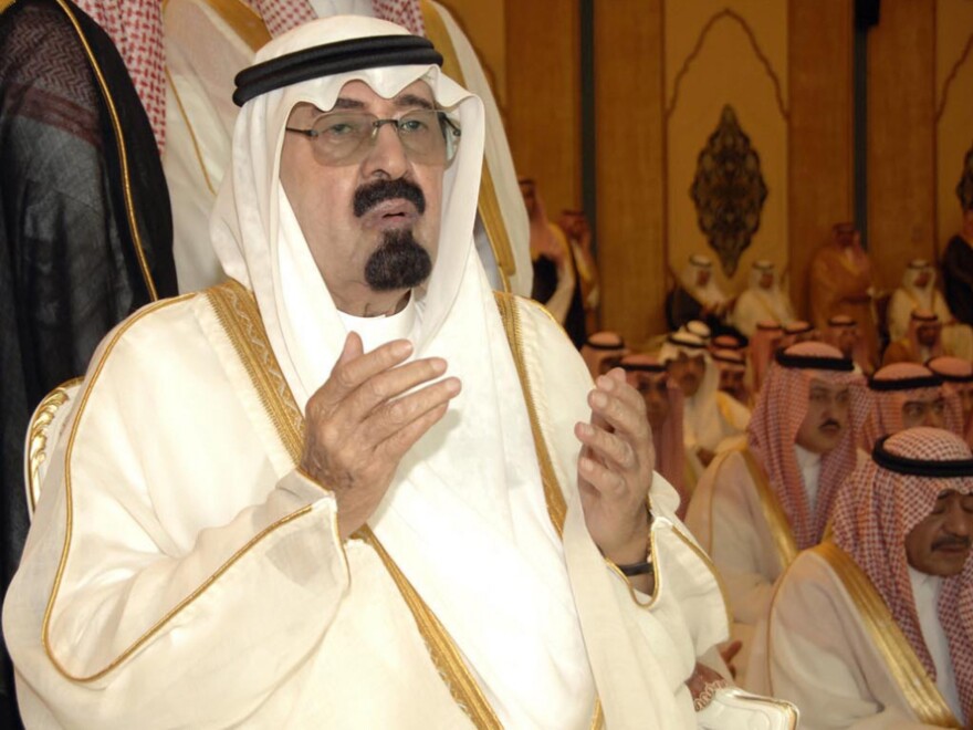 Saudi Arabia's King Abdullah, shown here in 2010, has sent troops to neighboring Bahrain and spent large sums at home in an attempt to limit popular unrest.