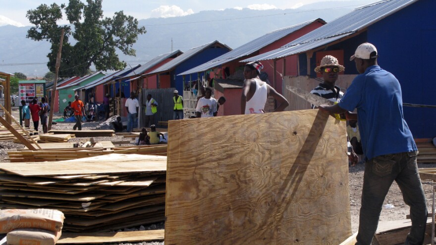 Last year, the Annex de Martissant area of Port-au-Prince was a camp for displaced people. The area was filled with tents. Today, locals are building sturdier shelters with funding from the American Red Cross.