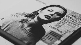 a book with taylor swift photo on the cover that also has clippings of news articles about taylor swift 