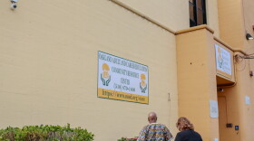 Left Kim Jones & right Michelle Deiro walk inside Oakland Adult and Career Education Community Resource