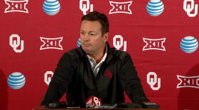 University of Oklahoma head football coach Bob Stoops addresses reporters during s January 6, 2014 press conference.
