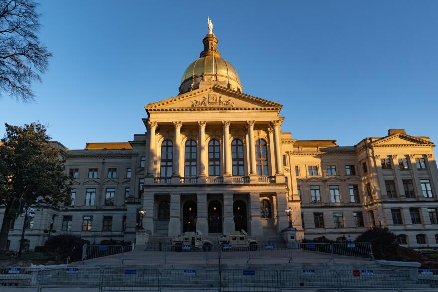 A file photo of the Georgia State Capitol in Atlanta. In a sign of the growing influence of conspiracy theories, a bipartisan mental health bill was almost derailed by unfounded accusations.