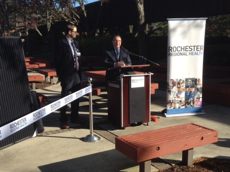 Director of Sustainability, Mark Waller (l), and President and CEO Eric Bieber, talking about Rochester Regional's green energy plans