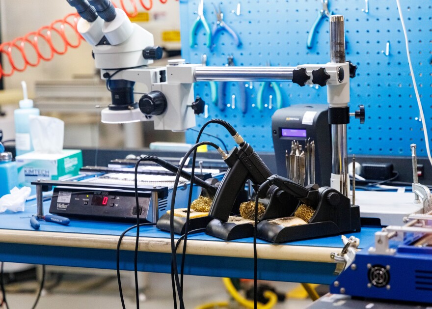 A Zentech workstation with multiple soldering irons.