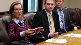 a woman in a striped shirt