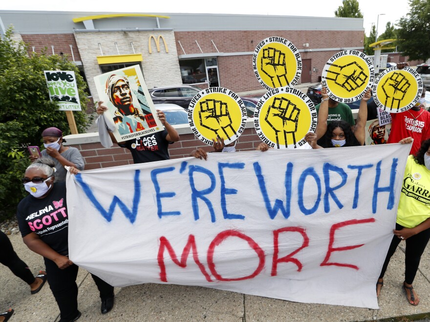 Protesters rally outside a McDonald's in Detroit on July 20. People walked off the job in several U.S. cities to protest systemic racism and economic inequality.