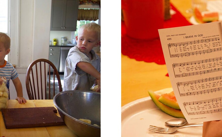 Two images, one of a woman in a head covering pouring a pitcher into a jar of pears with children looking on, another of a hymn printed on paper titled I Believe In God