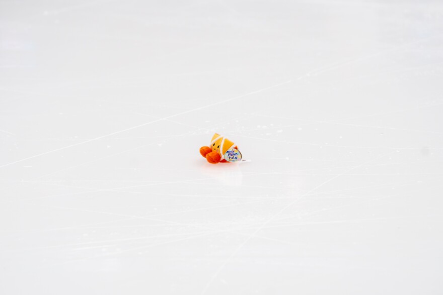 A stuffed orange sits on the ice following a women’s short program performance during the 2026 U.S. Figure Skating Championships at the Enterprise Center on Wednesday, Jan. 7, 2026, in St. Louis’ Downtown West neighborhood.