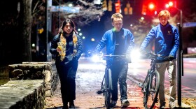 Sarah Peralta, seen walking back to her dorm with Nick Chappell (center) and Ian Bracken (right), said she feels comfortable using SafeWalk.