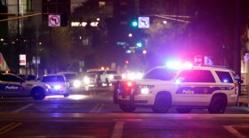 Phoenix Police Department vehicles block off a street in Phoenix, May 30, 2020.