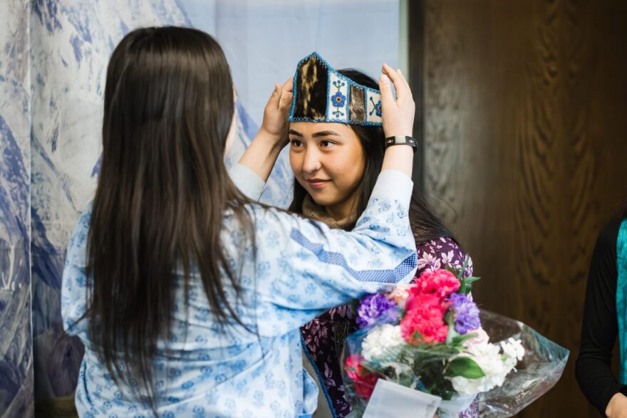 2024 Miss Arctic Native Brotherhood winner, Charity Lewis, crowns 2025 winner Brooke Anungazuk at the ANB Hall in Nome.