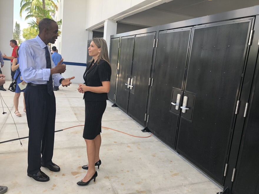 Broward schools Superintendent Robert Runcie and  School Board Member Donna Korn talk in front of the new entrance at Miramar High School on Wednesday.