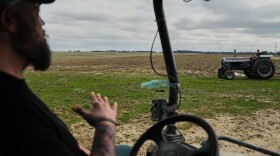 Wayne Greier, left, talks with his son, Blake, 13, right, as they move farm equipment Tuesday, March 10, 2026, in Canfield, Ohio.