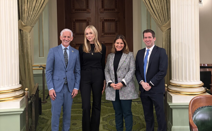 Depicted (left to right) is Josh Lowenthal, Aerin Cohn, an unknown state senator, and Marc Berkman. Taken at Sacramento State Capital on April 21, 2026 after Aerin Cohn's testimony in support of AB 1709 at the Assembly Standing Committee on Judiciary.